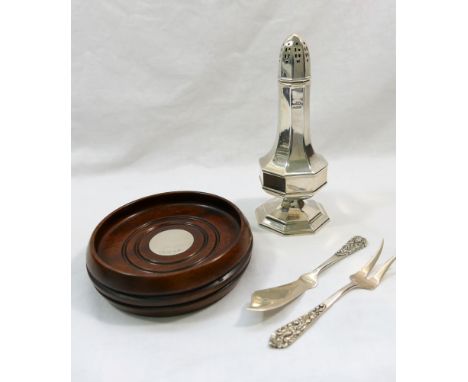 A silver wine coaster, the turned mahogany base centre set with silver disk, London 1988, a silver sugar caster, Birmingham 1