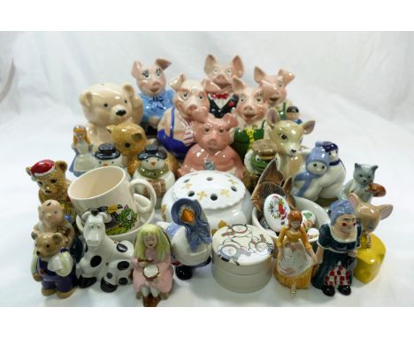 A collection of modern Wade figures including 'Mother Goose', 'Cinderella', 'The Wind in the Willows Toad', 'Dick Whittington