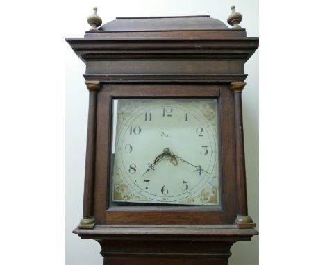 A 19th century oak cased 30 hour longcase clock, the painted face with Arabic numerals and date aperture, decorated with flow