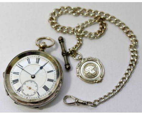 An open faced key wind pocket watch, the Continental case stamped '.935', the face with subsidiary seconds dial, glass lackin