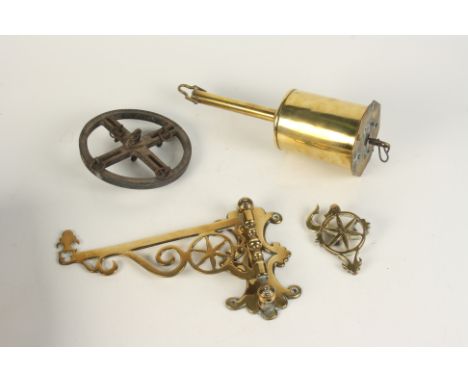 A Salters brass clockwork spit, with wall bracket.