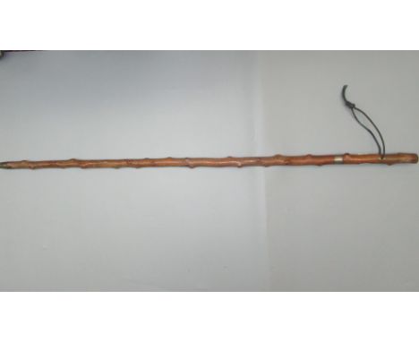 A steel bladed sword stick, concealed as a wooden walking cane, full length 89cm, length of steel 32.5cm. Condition report: T