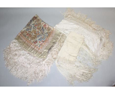 Three silk scarves, one ivory, fine silk scarf with crochet fringing. 90 x 96cm, together with another ivory silk scarf with 