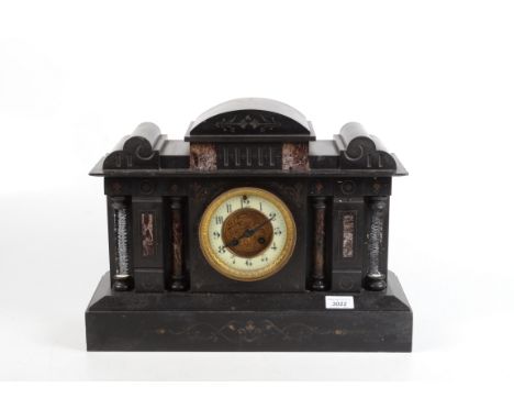 A French black marble cased architectural mantle clock.