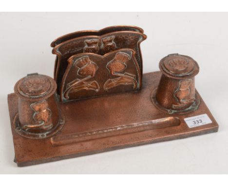 A Hayle copper inkstand, height 12cm, width 31cm. Condition report: Item is worn with several dents. 