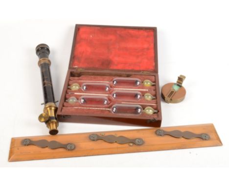 A wooden box inscribed 'Sikes' Hydrometer Thomas Armstrong &amp; Brother Ltd Manchester &amp; Liverpool No.A 515-555', contai