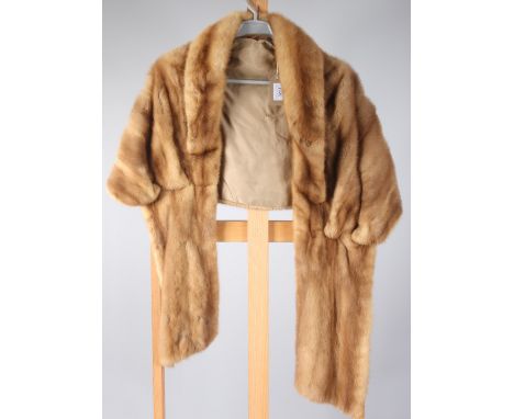 A light brown mink stole, with gold silk lining, length (when worn) 78cm, together with one other fur stole.