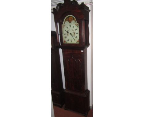 A George III mahogany longcase clock, the painted arched dial signed S. Kellett, Bredbury, with rolling moon, flanked by squa