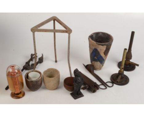 Laboratory items from Wheal Busy Mine, Chacewater. Including two Bunsen Burners, a tripod with mesh screen, an assortment of 