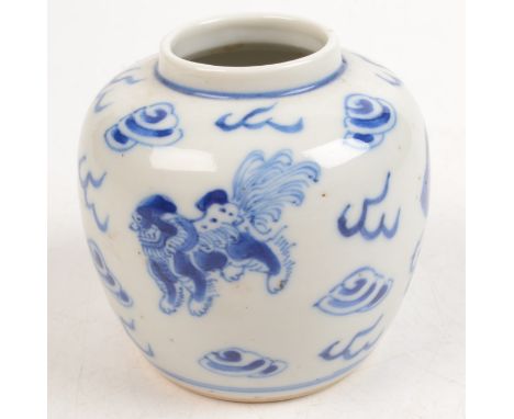 A Chinese blue and white porcelain ginger jar, decorated with dogs of fo and cloud scrolls, four character kangxi mark, heigh