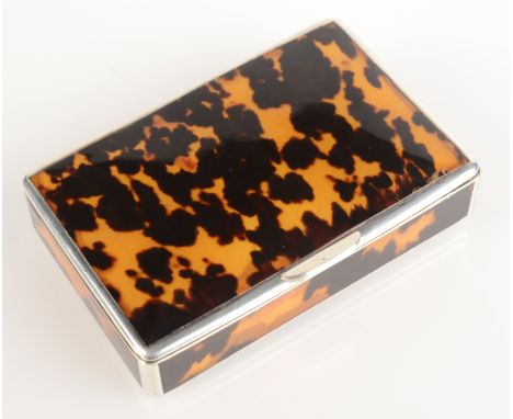 A silver snuff box with tortoiseshell panels, width 77mm. 