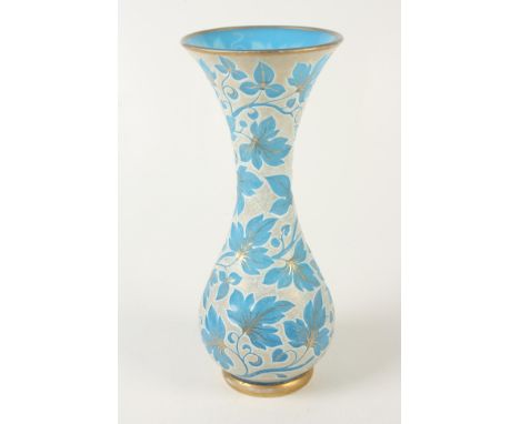 A continental blue glass vase, with white overlaid enamel and gilt leaf decoration, height 45cm, diameter of top 19cm.  Condi