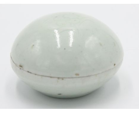 A Bernard Leach porcelain cosmetic box, with celadon glaze, the domed lid with incised flower, impressed St Ives seal and inc