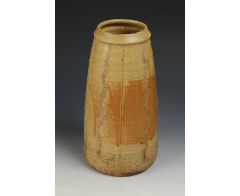 A rare and important Bernard Leach stoneware vase engraved with sgraffito kinked lines separated by cut vertical lines with c