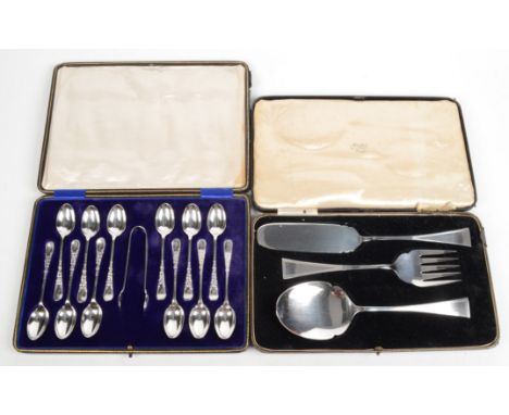 A set of twelve engraved teaspoons and tongues cased, together with a set of three Art Deco engine turned servers, cased.