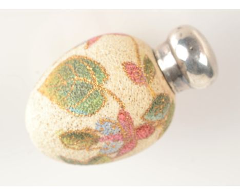 An egg shaped enamel and gilt perfume bottle, the plain silver lid with Birmingham 1888 hallmark.