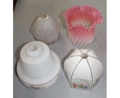 Three glass light shades and an oil lamp shade.
