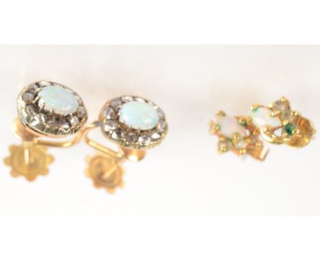 Two pairs of opal earrings.