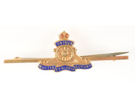 A 9ct gold enamel Royal Artillery brooch.