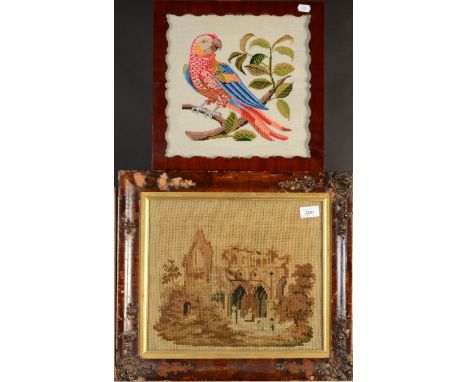 A woolwork picture of Duisburg Abbey, 19th century, 41 x 46.5cm, a needlepoint picture of a parrot, an alphabet sampler dated