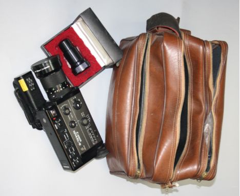A Canon 1014 XL-S cine camera, with accessories, etc, in brown carrying case.  Condition report: Cosmetically good. Cannot te