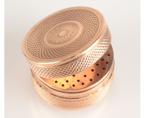 A gold engine turned cylindrical vinaigrette , diameter 25mm, 12.3g. Condition report: No condition issues noted other than m