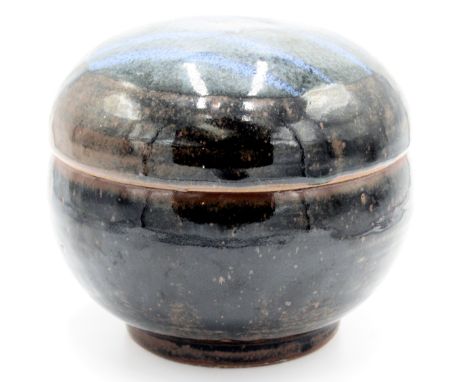 A Trevor Corser for Bernard Leach tenmoku glaze bowl and cover, height 18cm, diameter 20cm.