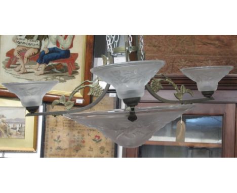 A metal and frosted glass ceiling light, height 67cm.