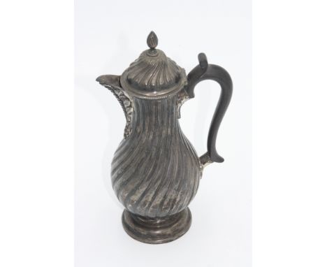 A Victorian silver hot water jug in French taste by Daniel and John Wellby, London 1894, the pair shaped body spiral fluted ,