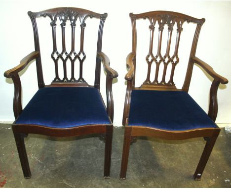 A set of eight good mahogany dining chairs, in Chippendale Gothic style, each with serpentine seat rail moulded square sectio