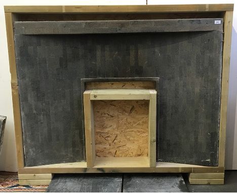 A Delabole slate fireplace, 1946, by Naum Gabo (1890-1977), height 102cm, width 137.5cm. Mantle shelf, 137.5 x 20.5cm, depth 