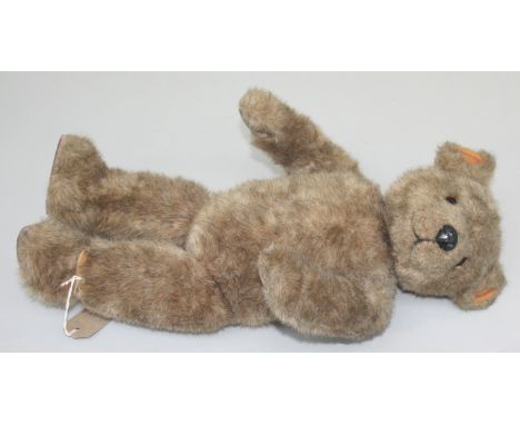 Two 1980s 'Little Folk', articulated mohair teddy bears, one light brown and one beige, each 47.5cm.