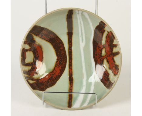 A Leach pottery celadon bowl, with abstract designs, diameter 26.3cm, height 7.5cm.