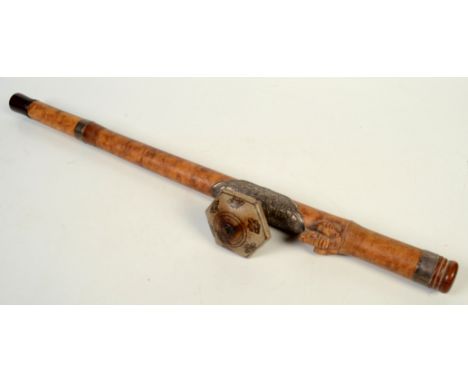 A Chinese bamboo opium pipe, 19th century, carved with a frog, the ceramic bowl signed to the underside with white metal sadd