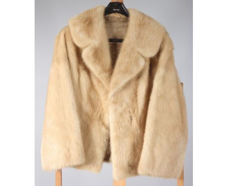 A lady's light beige mink fur coat, with floral patterned gold silk lining, length 65cm, size 8/10. Condition report: Excelle