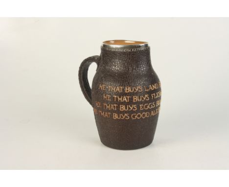 A Doulton Lambeth Slater's Patent stoneware Jug, with silver rim, the body inscribed  'HE THAT BUYS LAND BUYS STONES, HE THAT