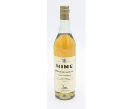 A bottle of Hine vintage 1973 cognac, 'Grande Champagne Landed in 1974 - Bottled in 1990 Findlater Mackie Todd &amp; Co Ltd. 