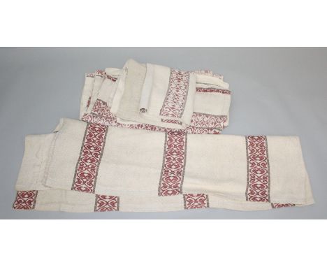 Four Rufflette brand, cream and light red, diamond weave curtains, each 70cm wide with a drop of 265cm.