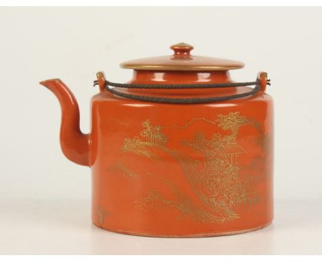 A Chinese coral ground porcelain teapot, 19th century, gilt decorated with a river scene, red seal mark, height 11cm, diamete