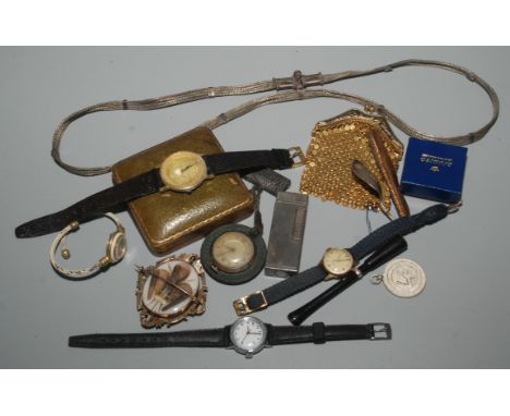 A silver plated Dunhill gas lighter, watches etc.