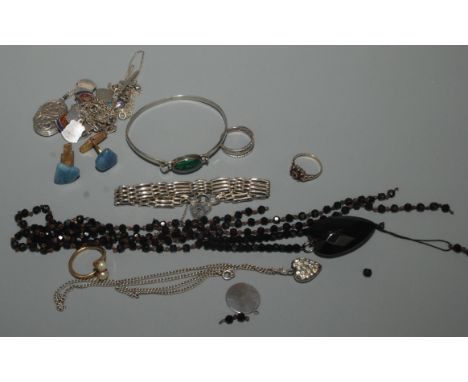 A silver bangle set an agate cabochon, a faceted jet bead and heart necklace, other silver jewellery etc. 