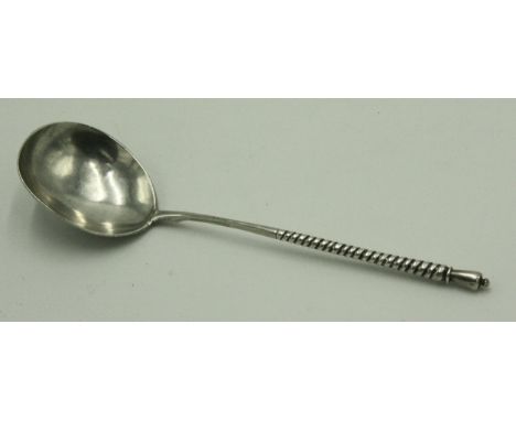 A Russian silver spoon with half twisted stem and urn finial, the back of the bowl chased with heart and foliate decoration, 