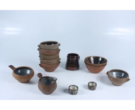 Thirteen pieces of Leach pottery.