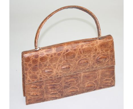A light brown crocodile handbag, 19 x 31cm.