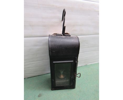 An LNER small station hanging lamp with reservoir and metal burner