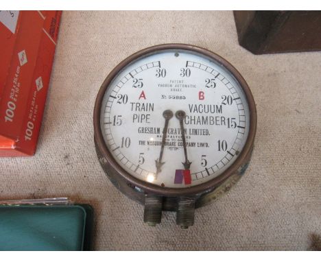 A brass 'Gresham & Craven' Limited' vacuum automatic brake pressure gauge No. 55883, train pipe and vacuum chamber