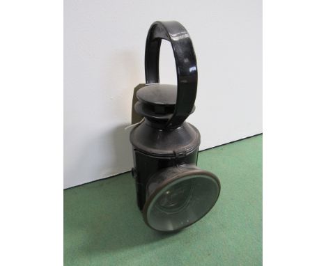 A L.T. (London Transport) three aspect handlamp embossed L.T., reservoir and ceramic burner