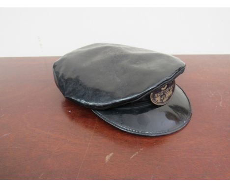 A MSLR engineman's hat with cap badge numbered 2124 and a LMS Locomotive Engineman handbook assigned to driver Hamilton May 1