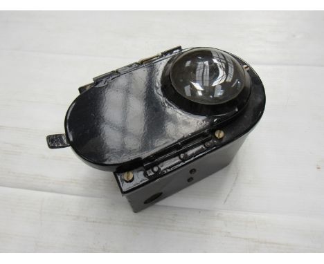 A black metal locomotive lamp off an 08 shunter, electric worked with convex glass front and rotating red aspect