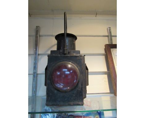 A black painted brake van side lamp with two clear bull's-eye lenses